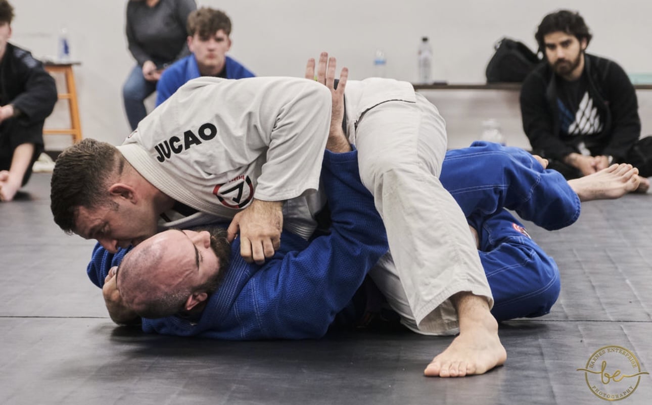 two people sparring during jiu-jitsu class at Gracie United - Team Jucao Red River